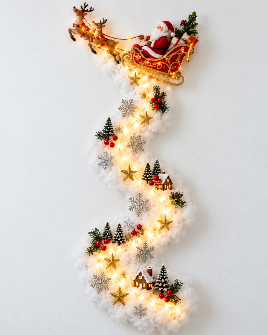 Santa sleigh wall light glowing above a snowy village